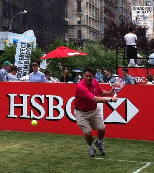 So I went out for lunch today and ended up playing tennis on grass in the middle of 23rd and Fifth Ave! Not sure why my tongue is sticking out here. I never used to do that.