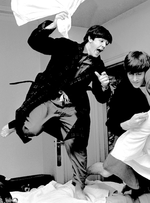 sheismylittlerocknroll: The Beatles having a pillow fight, photographed by Harry Benson in 1963. &ld