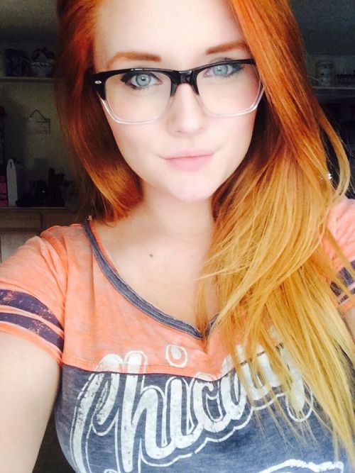 girlsglassesandasses: Blue eyes and orange hair.