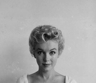 :  Marilyn Monroe photographed in 1956 © Milton Greene.   Cutie