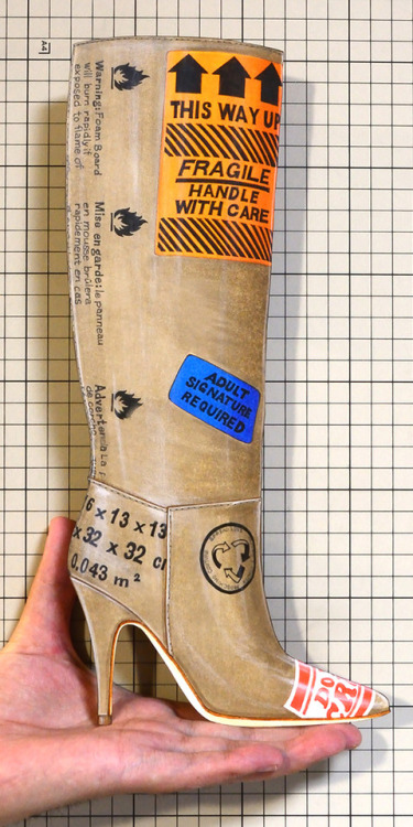 jumpei-kawamura:Shoe on a Palm：00822 “MOSCHINO” Cardboard Printed Leather Boot（FW2017）il