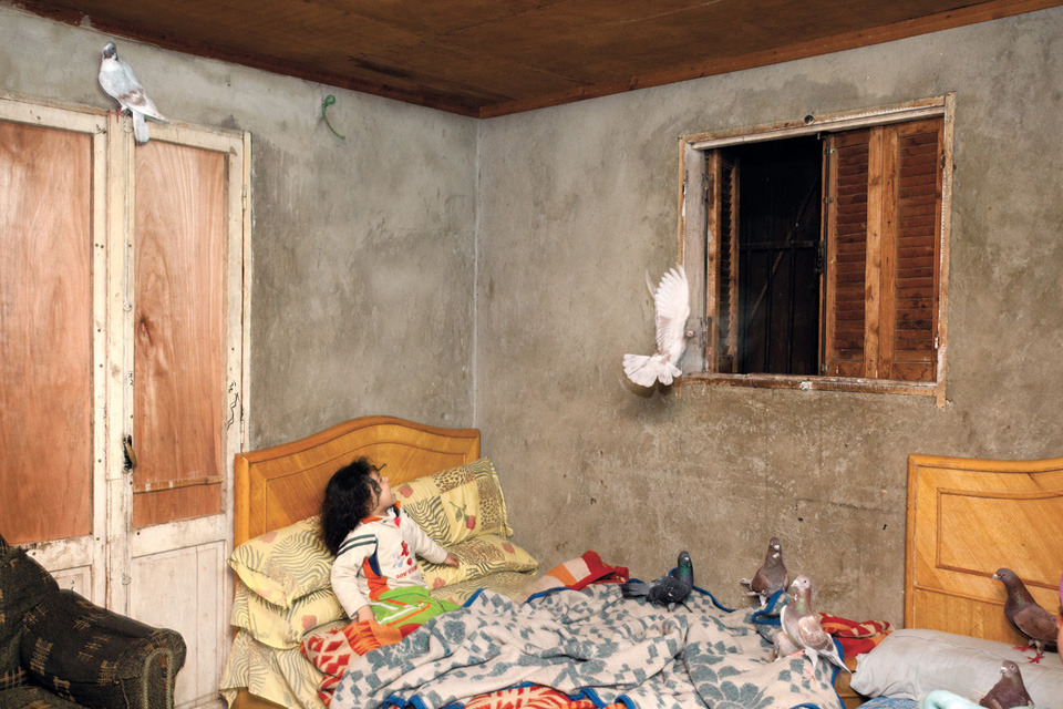 lagubeko:  A child inside a bedroom in a private Egyptian home during the Arab Spring,