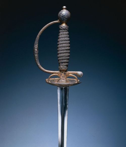 art-of-swords:  Small Sword Dated: 1780 Culture: French Medium: forged steel blade; partially gilt and russet steel hilt; steel wire, leather bands, wood core Measurements: overall - l:103.50 cm (l:40 11/16 inches) Wt: .36 kg; blade - l:86.10 cm (l:33