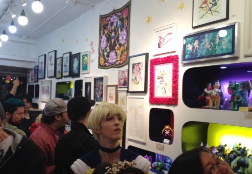 natsukigirl:  Some pix from the 20th Anniversary Sailormoon art show at Qpop in Little Tokyo // Los Angeles, CA - April 5, 2014 I bought the retro cosmonaut looking Sailormoon print called ‘Retro Moon’ by hyamei (but I don’t get to take it home