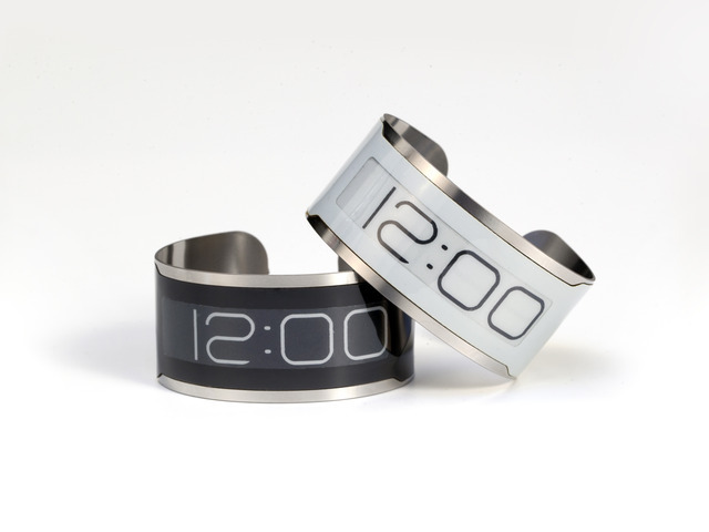 E-Ink Thinnest Watch - as thin as a credit card. It charges for 10 minus, lasting