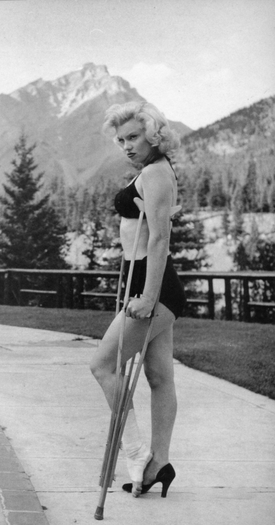 emigrejukebox:  Marilyn Monroe with a sprained ankle in Banff, 1953 Photo by John Vachon, February 1