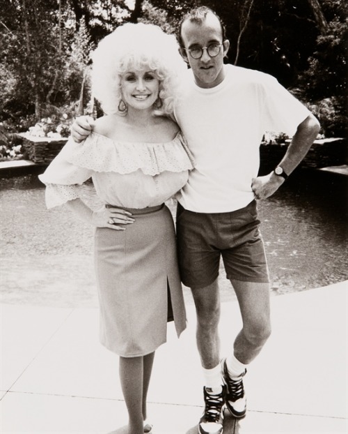 twixnmix:   Dolly Parton and Keith Haring photographed by Andy Warhol, 1985.