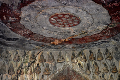 The ceiling of one of the grottoes housing one of the many thousands of Buddhas at the Longmen Grott