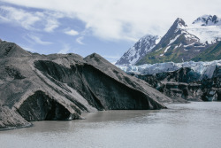 beyondcrowds:  Rock chewed up by ice, then left behind. Lateral Moraine, Spencer Glacier, Alaska  