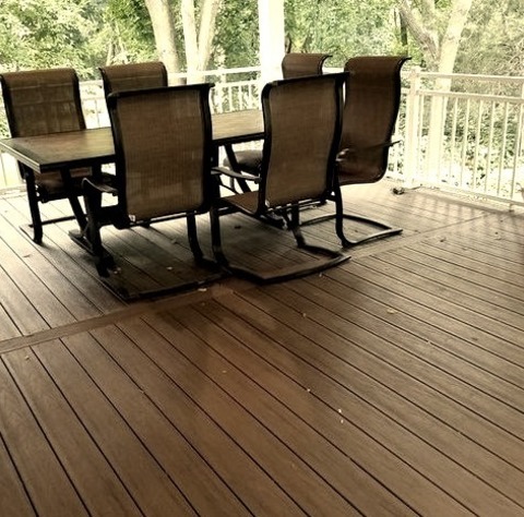 DeckLarge Backyard Deck Photo With A Roof Extension