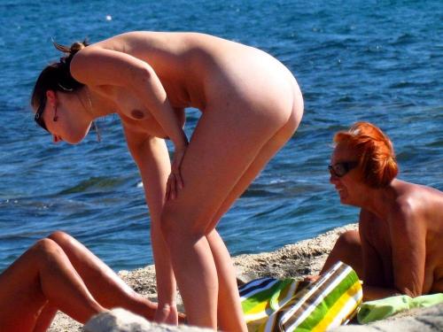 real-naturist-beach:  Mother and daughter undressing on a nude beach