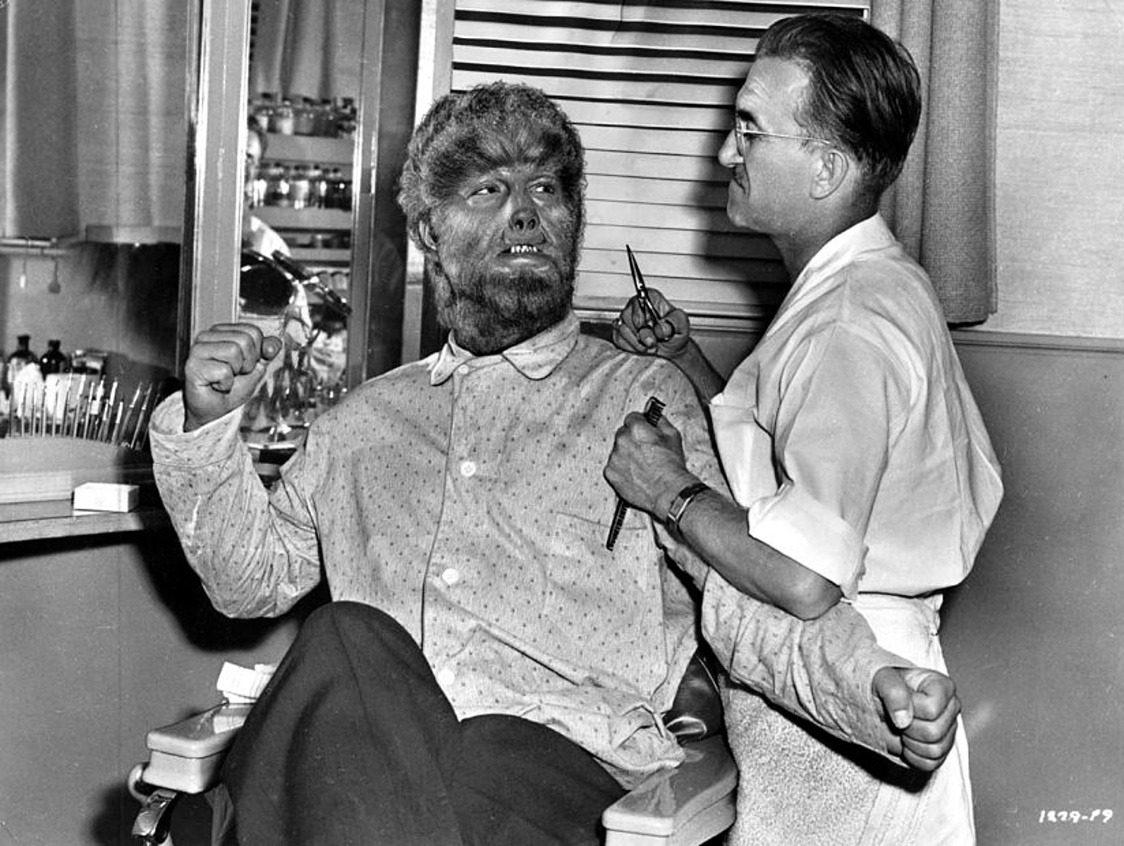 Lon Chaney Jr. and Jack Pierce have fun during a makeup session for Frankenstein