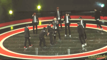 yokpop:  Lay running across the stage because he went to the wrong side.  Kris granny jogging behind him.  