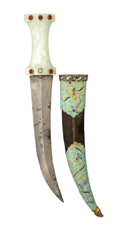 Turkish dagger with stone hilt mounted with gems, polychrome enameled sheath, 19th century.from Olym