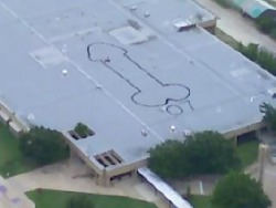 takeoffyourpantsbitches:  pimposaur:  In 2007, the seniors at my high school spray painted this on the roof of one of the buildings at school for a senior prank. It was only discovered a year later after a news reporter in a helicopter spotted it and