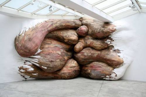 odditiesoflife:  Trees Burst Through Gallery Walls and CeilingsBrazilian artist Henrique Oliveira’s powerful recycled wood art installations snake through their exhibition spaces like massive living trees that burst out of walls and through ceilings.