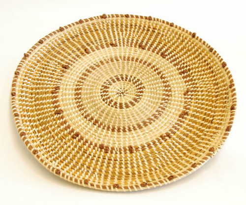 Sweetgrass rice fanner with pine knotsMultiple views of a circular, flat sweetgrass basket with a ha