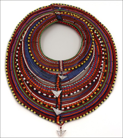 Beaded collar from the Maasai, Kenya. Glass beads, metal string, and metal.