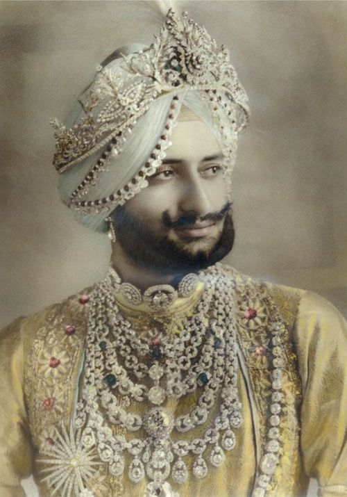 Sir Yadavindra Singh, Maharaja of Patiala, wearing the collar of diamonds and platinum parade create