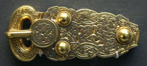 Gold belt buckle from the ship-burial at Sutton Hoo. Anglo-Saxon, early 7th century AD. From Mo