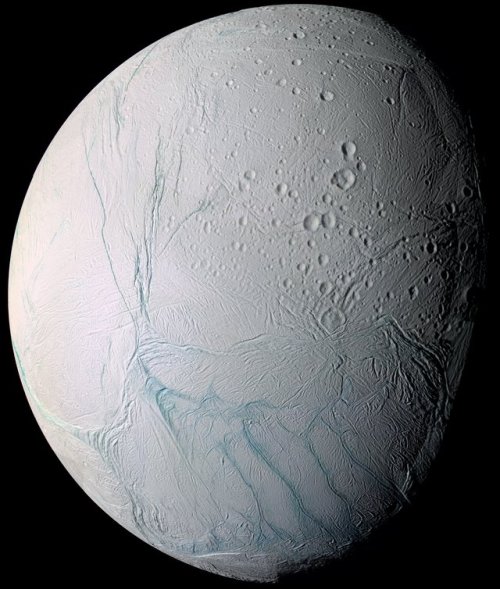 Saturn’s Moon Enceladus, photographed by the Cassini Spacecraft. Stocktrek Images; Getty Image