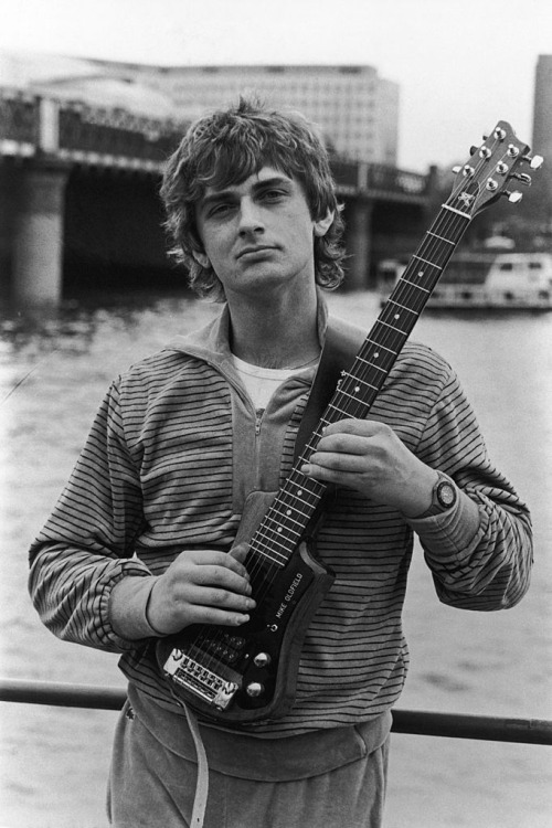 sickfink2:Mike Oldfield with a custom guitar circa 1985.Photo by Dave Hogan.