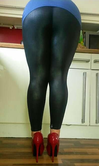 lickmywife69:Love my wife’s arse in her shinny leggings and red stilettos.