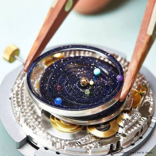 mizurda:  moonfall-requiem:  If you’ve ever wondered when Jupiter will next be aligned with Mars, Van Cleef & Arpels has a watch that will tell you. Its new Midnight Planetarium Poetic Complication watch has six rotating disks, each bearing a tiny