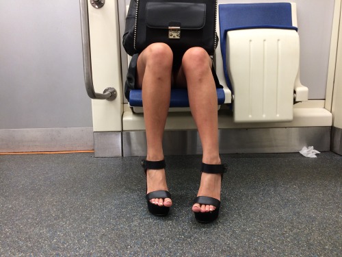Ideal legs and perfect feet in metro.