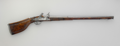 Ornate snaplock or snaphaunce carbine from Brescia, Italy.  Barrel by Lazzarino Comizzano. Artwork b