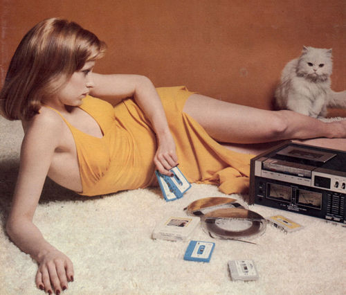chickswithrecords:  “the downstairs-where we met—I’d brought records, she’d cassettes.  lost a break, found her shake, Jenifa, oh Jenny.  transcripts showed more than flirt, ‘I love daisies’ read her shirt….”
