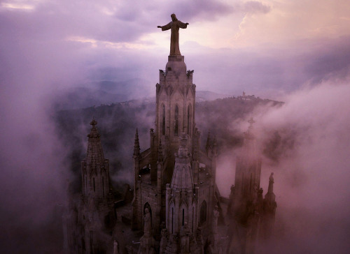 softwaring:  Clouds swirl through the pillars of Sagrat Cor Church, high on a hill above Barcelon  Amos Chapple