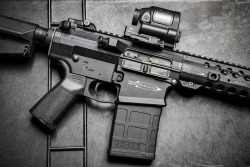 stickgunner:  Magpul Industries Corp. PMAG 20 LR/SR GEN M3 is now shipping.  Also shown here is the Centurion Arms .308 and the Trijicon, Inc. SRS optic. 