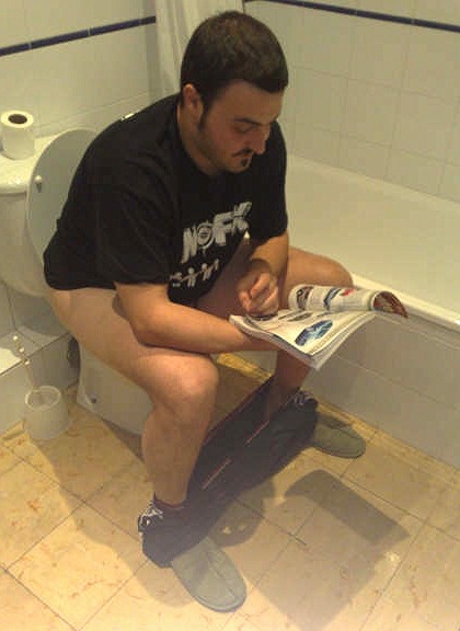 radioactivepolitics:  Men taking a shit and trying to do some reading in the process.  Why is t