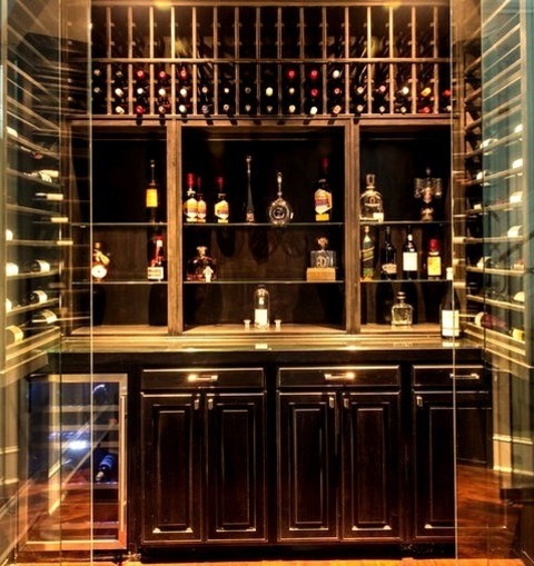 Medium - Transitional Wine CellarExample Of A Mid-sized Transitional Medium Tone Wood Floor And Brown