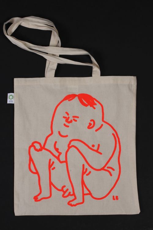 I printed this contented nudist some time ago.Silkscreen print with neon red on a bag.Photo credits 