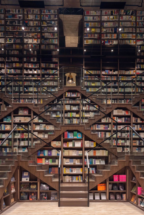 archatlas:      Zhongshuge Bookstore  Zhongshuge Bookstore in Chongqing city has an interior that’s the stuff of fantasy tales. Designed by architecture firm X+Living, the location—dubbed one of the most beautiful bookstores in China—is a mirrored