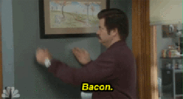 fatboyracer: sumisa-lily:  Baby’s First Taste of Bacon. This is HILARIOUS.  Mmmmmm….