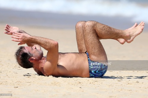 bizarrecelebnudes:  Andrew O’Keefe - Aussie Tv Presenter (Part 1) Love him. He always loves showing of in speedos by the beach. Love his hairy body. 