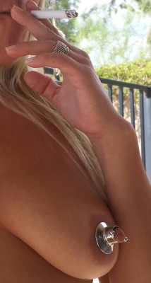 scottnikipowers:  Here is the smokers picture requested with nikis awesome nipple in the picture!  Offf sexy baby