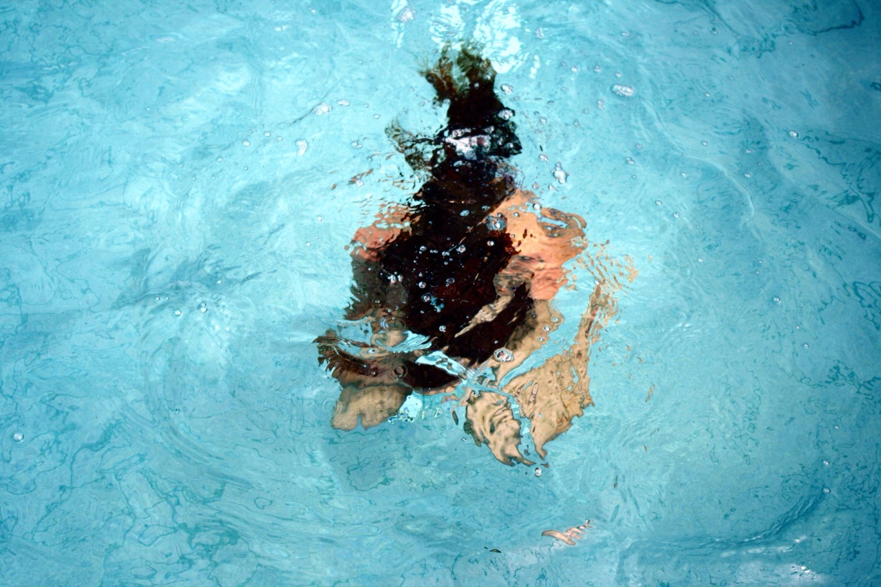 contiguousness:  There’s comfort at the bottom of a swimming pool. I’m holding