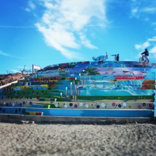 These steps and the community mural are about a mile up the beach. This is where we sit and enjoy our crevice made by Yiyo, the guy on the bike at the top right of the steps. He’s closed Mon/Tue, but still comes out to enjoy the view. (at Blvd....