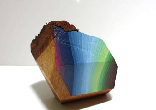 sixpenceee:Artist Victoria Wagner works with large pieces of reclaimed wood sliced into geometric forms and painted to resemble large gemstones.