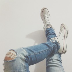 ahwaken:  Ripped jeans and white chucks are