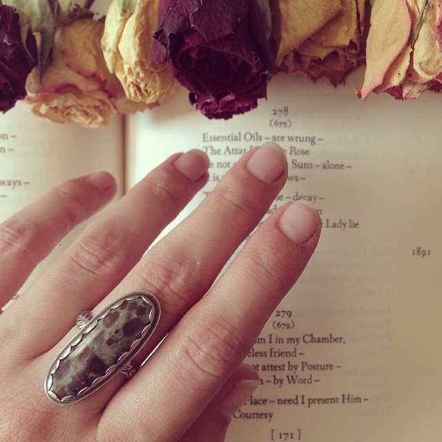 “Essential oils - are wrung -
The Attar from the Rose
Be not expressed by Suns - alone -
It is the gift of Screws - ” - Emily Dickinson.
One of my favorite poems inspired this ring featuring oolitic limestone, that boasts rose-like circles of deep...