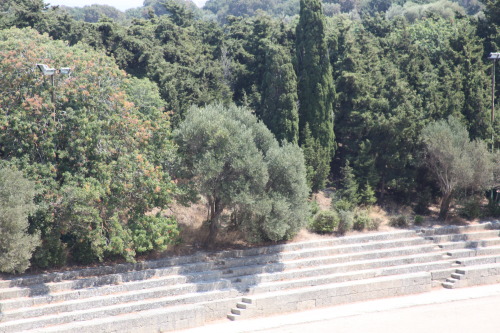 shatteryourleaves:The ancient stadium and theater from the Acropolis of Rhodes Town, originally cons