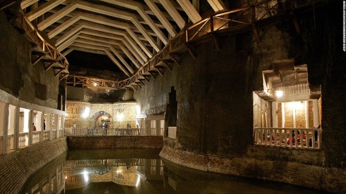 placesandpalaces: Wieliczka salt mine, Poland In southern Poland, Lake Wessel lies inky and unmoving in the deep. Filling the bottom of an old salt mine, it’s just one component of the UNESCO World Heritage Site which has been a functioning mine since