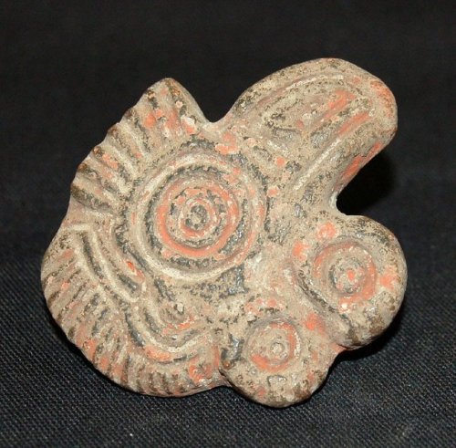 Two Aztecpottery body stamps (Post-Classic, Texcoco, Mexico):Decorated withan abstract human-like fi