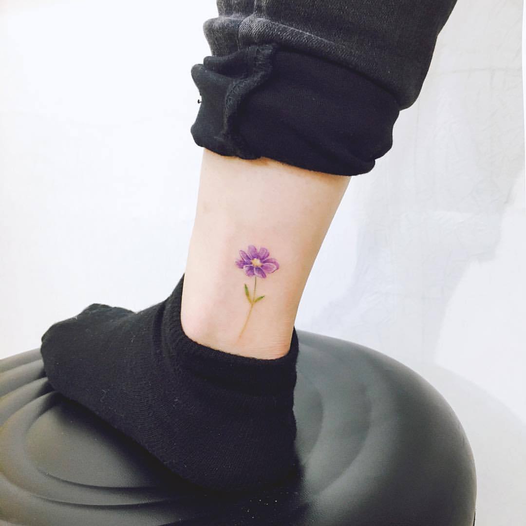 cosmos flower tattoo black and white  Black and white flower tattoo White flower  tattoos Cosmos tattoo