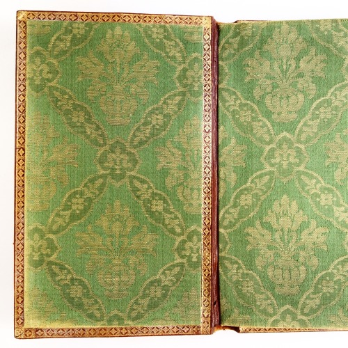 Ornate gilt calf binding with what appears to be the royal coat of arms of Louis XV in the centre - 